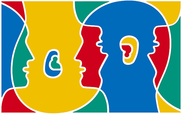 The official illustration for the European Day of Languages. A schematic picture of human heads overlapping each other like Venn diagrams. The different sections of the image are green, blue, yellow and red.